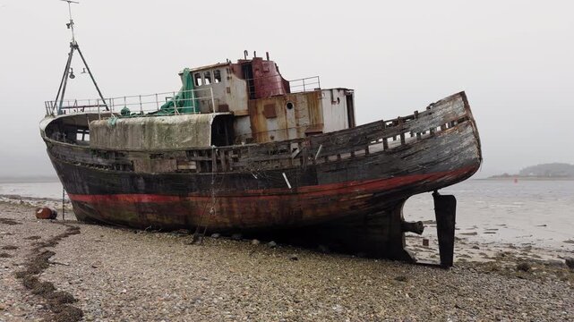 Historic Abandoned Corpach Shipwreck on a Pebble Beach, Scotland, Maritime Heritage