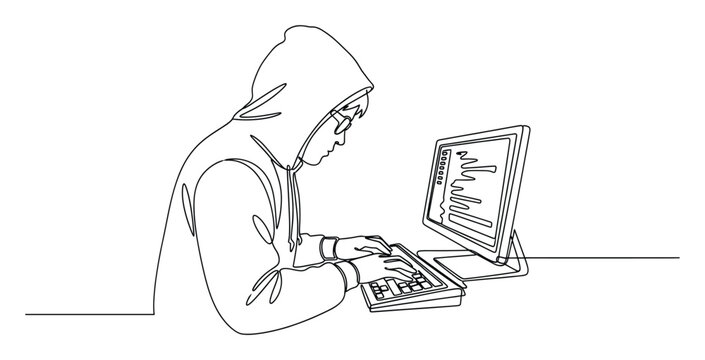 Hooded figure typing code on a computer keyboard for cybersecurity development projects