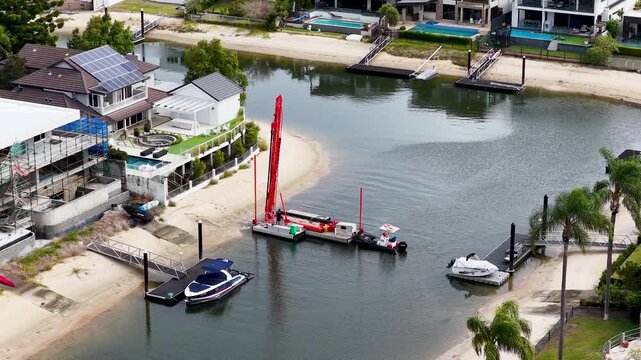 Aerial View of Red Piling Rig Barge in Gold Coast Canal