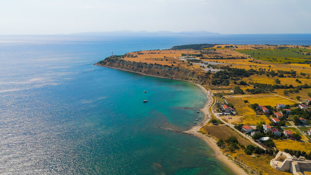 Seddulbahir, Eceabat, Turkey. Panoramic aerial view of Helles Memorial obelisk and Mehmetcik Feneri lighthouse with Aegean Sea and Dardanelles Strait on clear day. Aerial view.. Aerial View