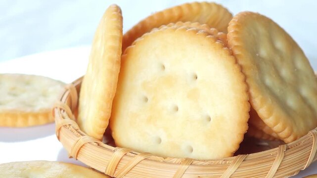 Freshly baked crackers served on a plate.