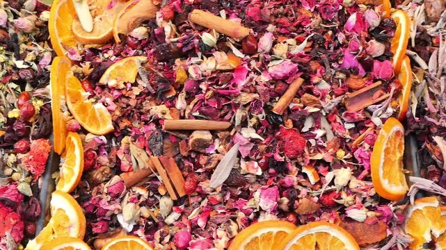 Explore dried flowers and spices in a busy market