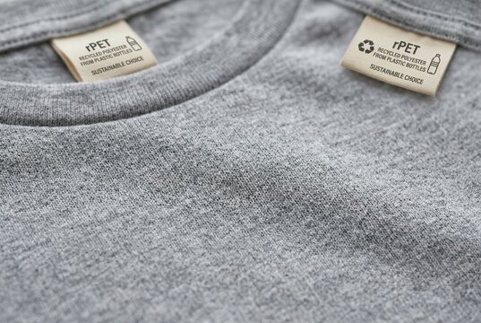 Extreme macro shot of grey heathered cotton or polyester knit textile