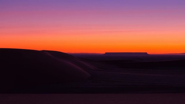Desert Dusk Scene. Calm Sandy Terrain Featuring Sunset Tones And Distant Plateau Silhouettes For Visuals