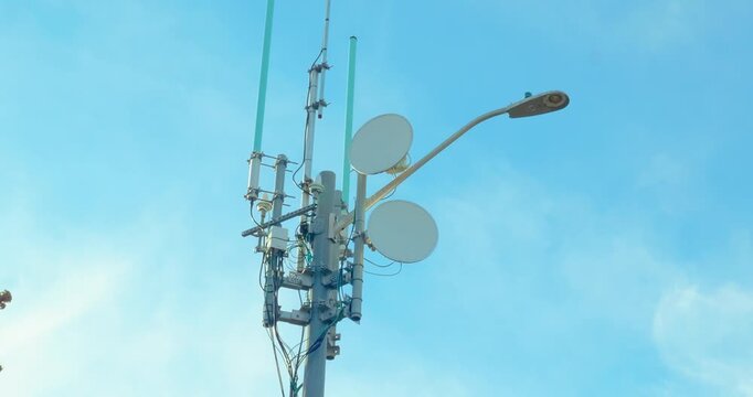 Small cell 5G antenna installed on urban street light pole