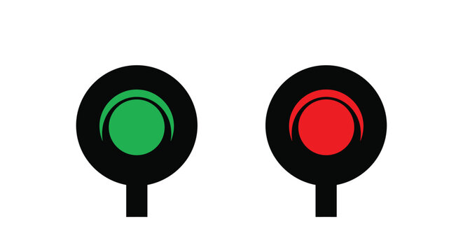 Traffic light signals showing red and green lights in round black housings for transport management, safety, and start stop control indicators.