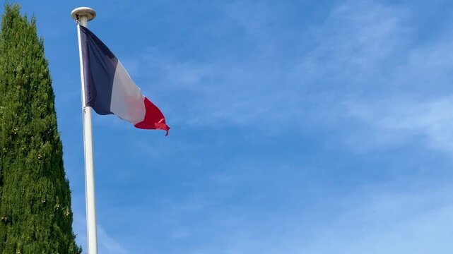 French Flag Waving in Marseille Blue Sky