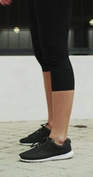 Outdoor, legs and workout for fitness, jump or person with footwear for physical activity and health. Athlete, training and exercise routine for wellness at house, feet and active with sneakers