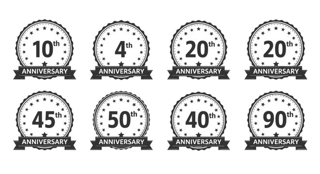 Collection of black and white anniversary badges and labels featuring various years from fourth to ninetieth with ribbon and star details.
