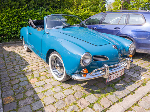 April 25, 2026, Eppegem, Belgium. Vintage Volkswagen Karmann Ghia convertible parked on cobblestone street