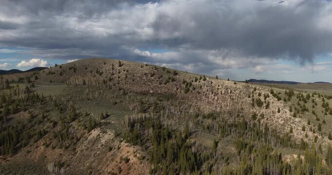 Aerial of Ashley National Forest Uinta Mountains in Utah with dramatic sky in spring