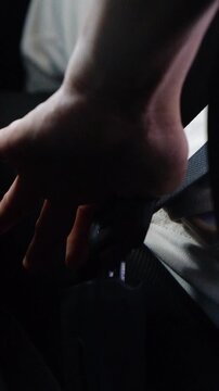 The process of clipping the seat belt in the car close up