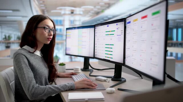 Project Manager Tracks Employee Hours Using Computer