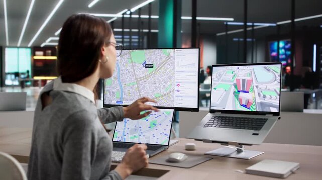 Young Professional Using GIS Software To Plan Land