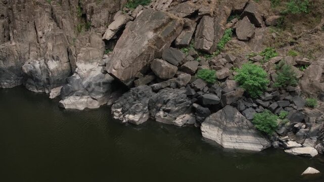 Low flow volume from the Haew Narok waterfall in the dry season. Rain forest at Khao Yai National Park in Thailand.
