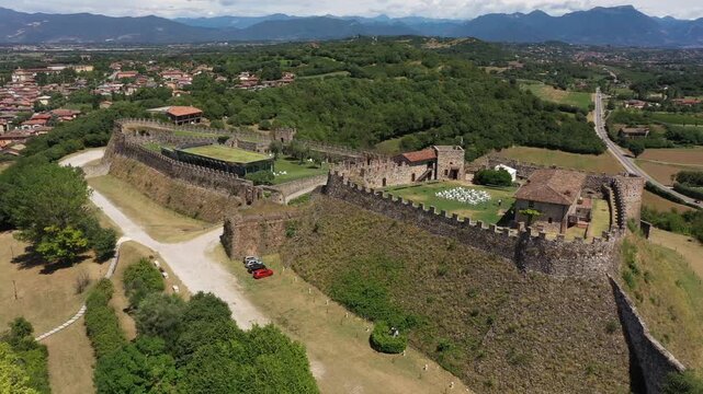 Cinematic aerial shot of the Rocca di Lonato del Garda overlooking the scenic Lake Garda region