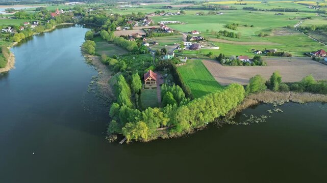 Drone Shot of Lake Shore with Trees and Farmland &ndash; 4K ProRes