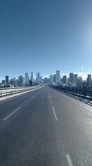 Fototapeta premium Expansive Highway Leading Towards a Modern City Skyline Under a Clear Blue Sky