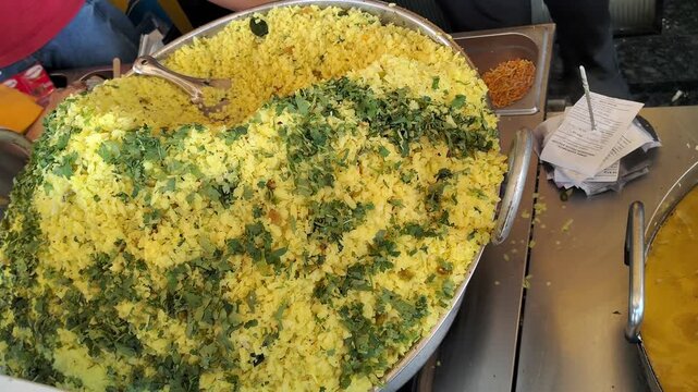 Massive Serving of Famous Indori Poha Garnished with Coriander