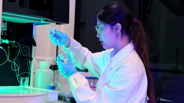 Laboratory experimentation process research facility video content high-tech environment close-up view scientific exploration