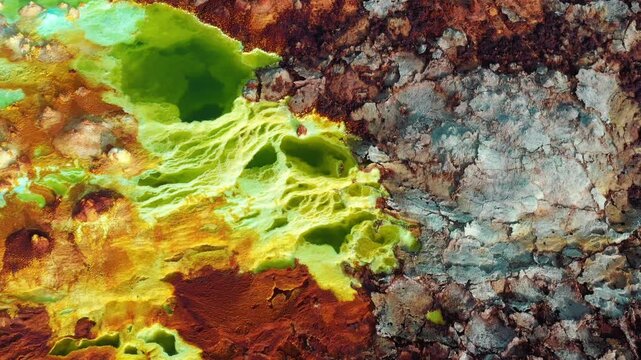 Aerial view of the colorful sulfur deposits and mineral crusts of the Dallol hydrothermal field in the Danakil Desert Dalol, Afar, Ethiopia.