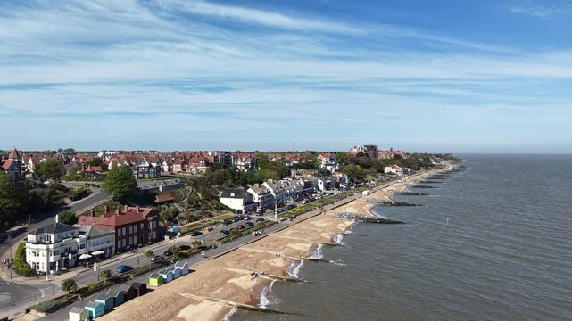 Felixstowe Suffolk UK beach on sunny day drone aerial high angle 4K footage