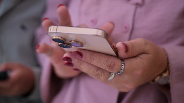 vibrant lifestyle photo of a modern family interacting with an artificial intelligence assistant on smartphone.