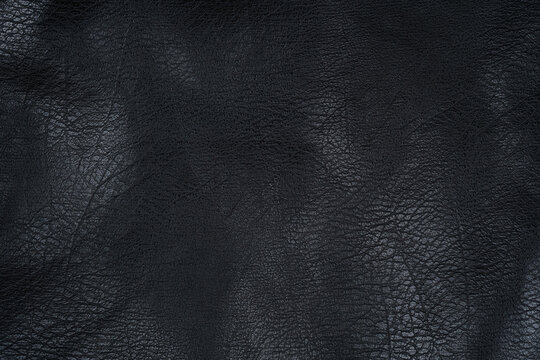 Black leather fabric texture detailed surface close up