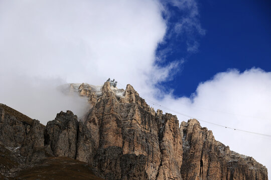 View of the cable car station  to Sass Pordoi, a 2,950 m high, plateau-like rock peak in the Dolomites, Italy