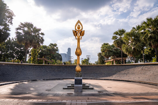 Golden Kinnaree Statue Close-Up Against Cloudy Sky Thailand