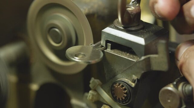 Duplicating Key Using Key Cutting Machine in Door Workshop