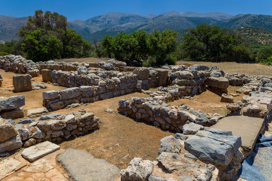 Remains of ancient stone structures at Malia archaeological site in Greece