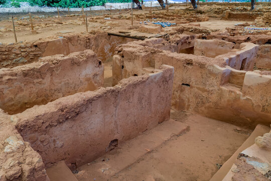 Stone foundations and room structures at an archaeological site in Crete, Greece
