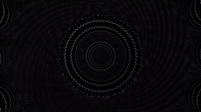 The intricate dark fractal pattern features a seamless spiraling motion with soft neon glow effects and symmetrical geometric shapes that expand from a central point in a deep black space.