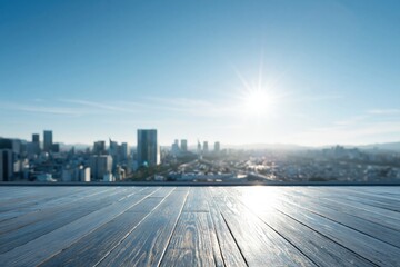 Naklejka premium Sunlit Wooden Deck Overlooking a Blurry Cityscape with Modern Skyscrapers Under a Clear Blue Sky