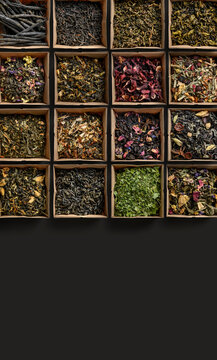 Large assortment of tea on a dark background. The view from the top