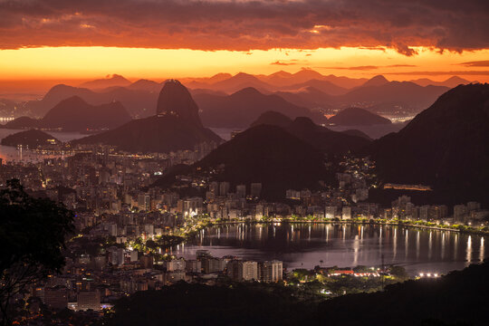 Beautiful view to rainforest sunrise, city and mountains