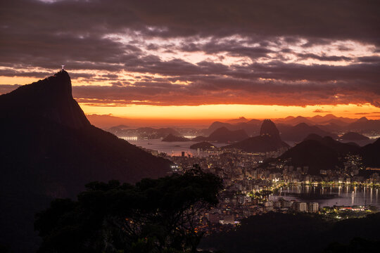 Beautiful view to rainforest sunrise, city and mountains