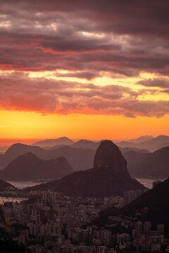 Beautiful view to rainforest sunrise, city and mountains