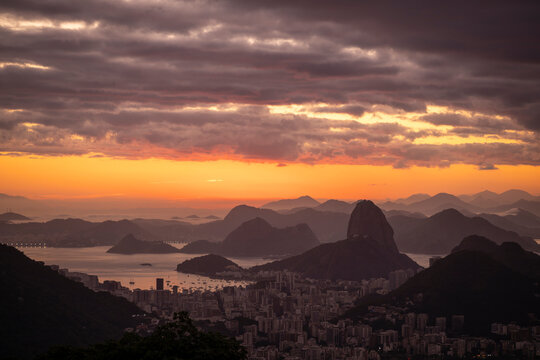 Beautiful view to rainforest sunrise, city and mountains