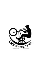 Fototapeta premium BMX Rider Silhouette Performing Wheelie Trick