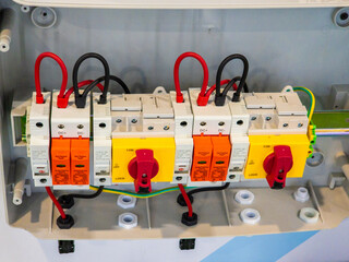 Obraz na płótnie Canvas Photovoltaic DC Combiner Box with Surge Protection and Isolator Switches for Solar Power System