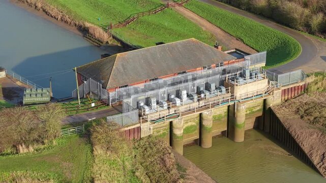 Aerial view of Hobhole Pumping Station and drainage channels in Lincolnshire, UK.