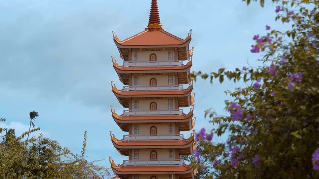 Seven-Story Memorial Tower at the Vinh Trang Pagoda is a 35 meters high seven-tiered structure that blends traditional Vietnamese elements with Khmer and European architectural influences in Ho Chi Mi