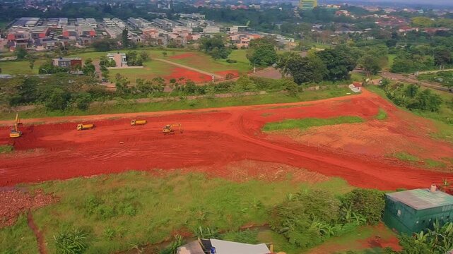 Aerial Drone View of Land Development and Heavy Equipment Construction Site in Urban Indonesia