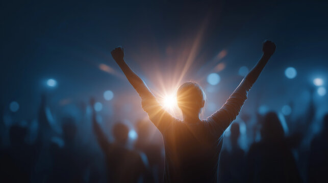Enthusiastic Crowd: A silhouetted figure stands out against a backdrop of a blurred cheering crowd, arms raised in elation and victory, creating a dynamic visual that evokes triumph.