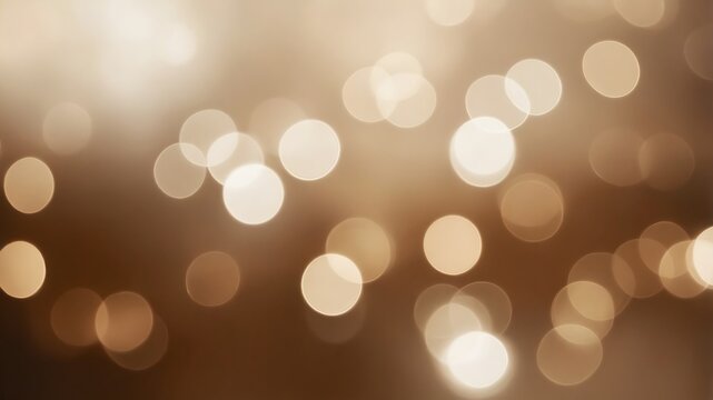Fondo abstracto con luces desenfocadas c&aacute;lidas y efecto bokeh en tonos dorados y marrones
