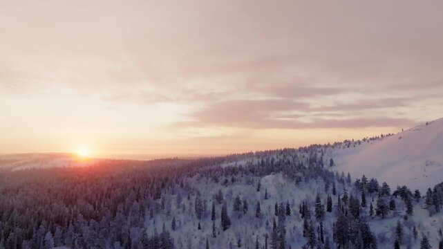 Magical Kaamos Ending: Sun Rising Above Frozen Winter Horizon in Lapland, Finland