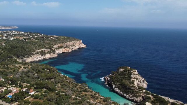 Drone revealing scenic Calo dell Moro landscape in Mallorca Island Coastline, Spain