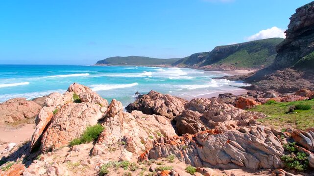 Rugged coastline and sea cliffs along Robberg Nature Reserve headland in Plett